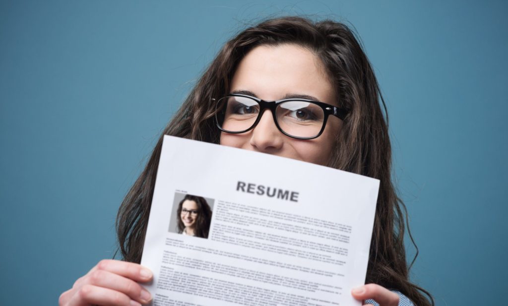 teenage girl with her resume
